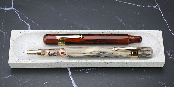 taccia_covenant_se_parchment_swirl_and_persimmon_winds _fountain_pens